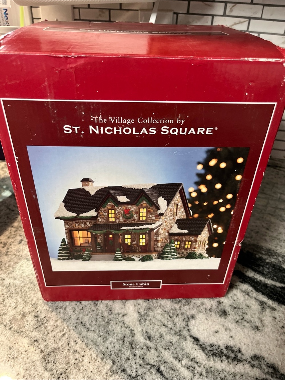 St. Nicholas Square Red and White Holiday Village Stone Cabin Box Art